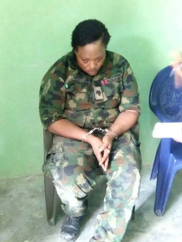 Photos: Fake Female Army Officer Caught With 3 Kids All Tied With Bombs In Abuja